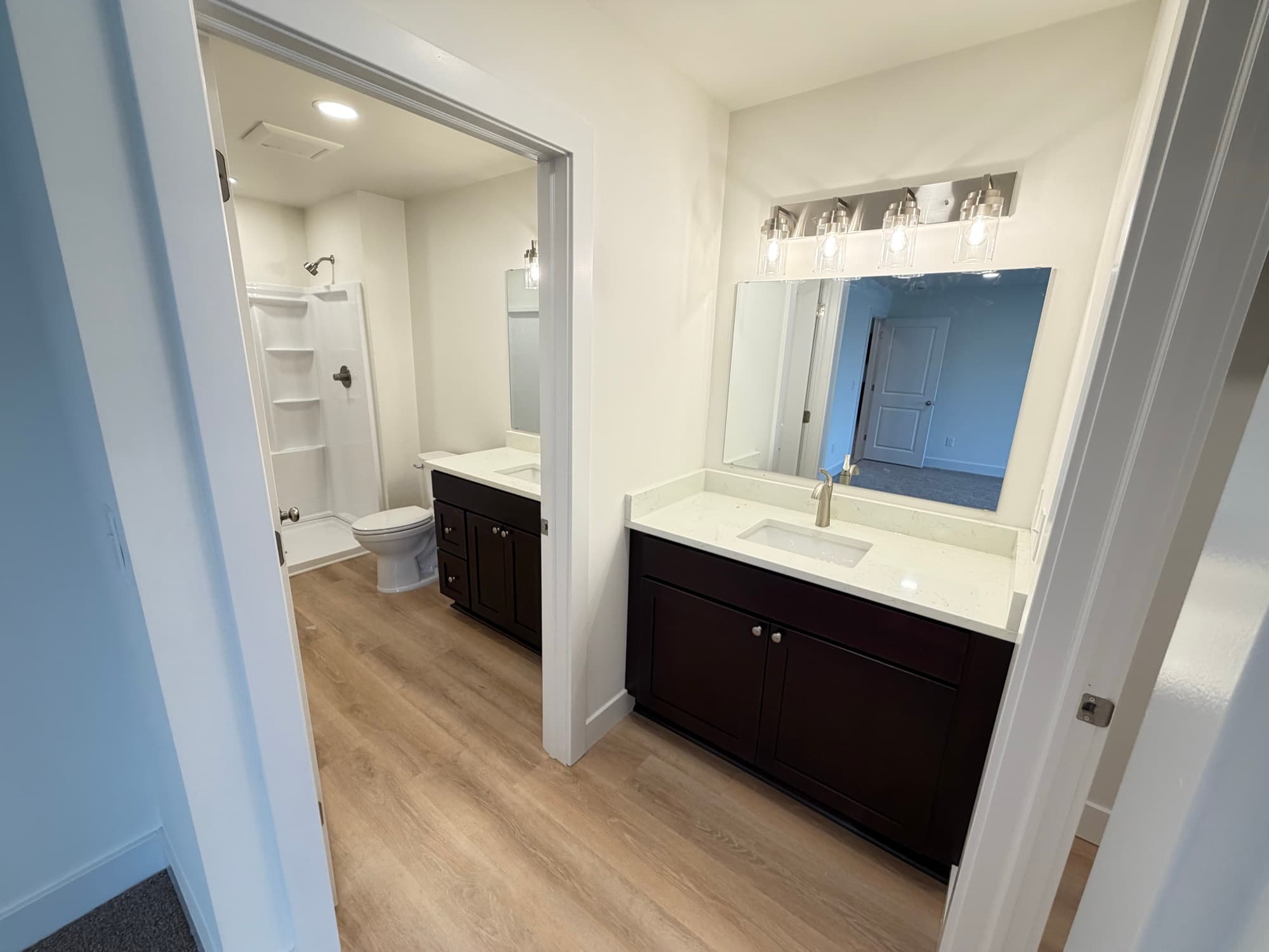 Modern, well-lit baths